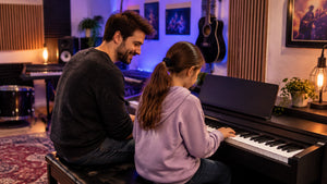 A student learning piano with an encouraging tutor in a welcoming teaching studio